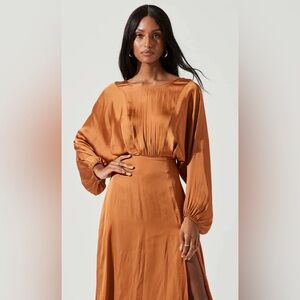 Gorgeous satin-finish amber dress.